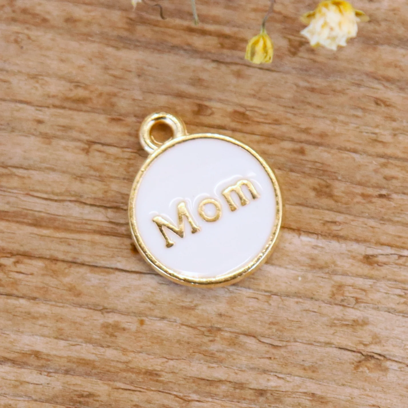 Enamel bedel - mom goud