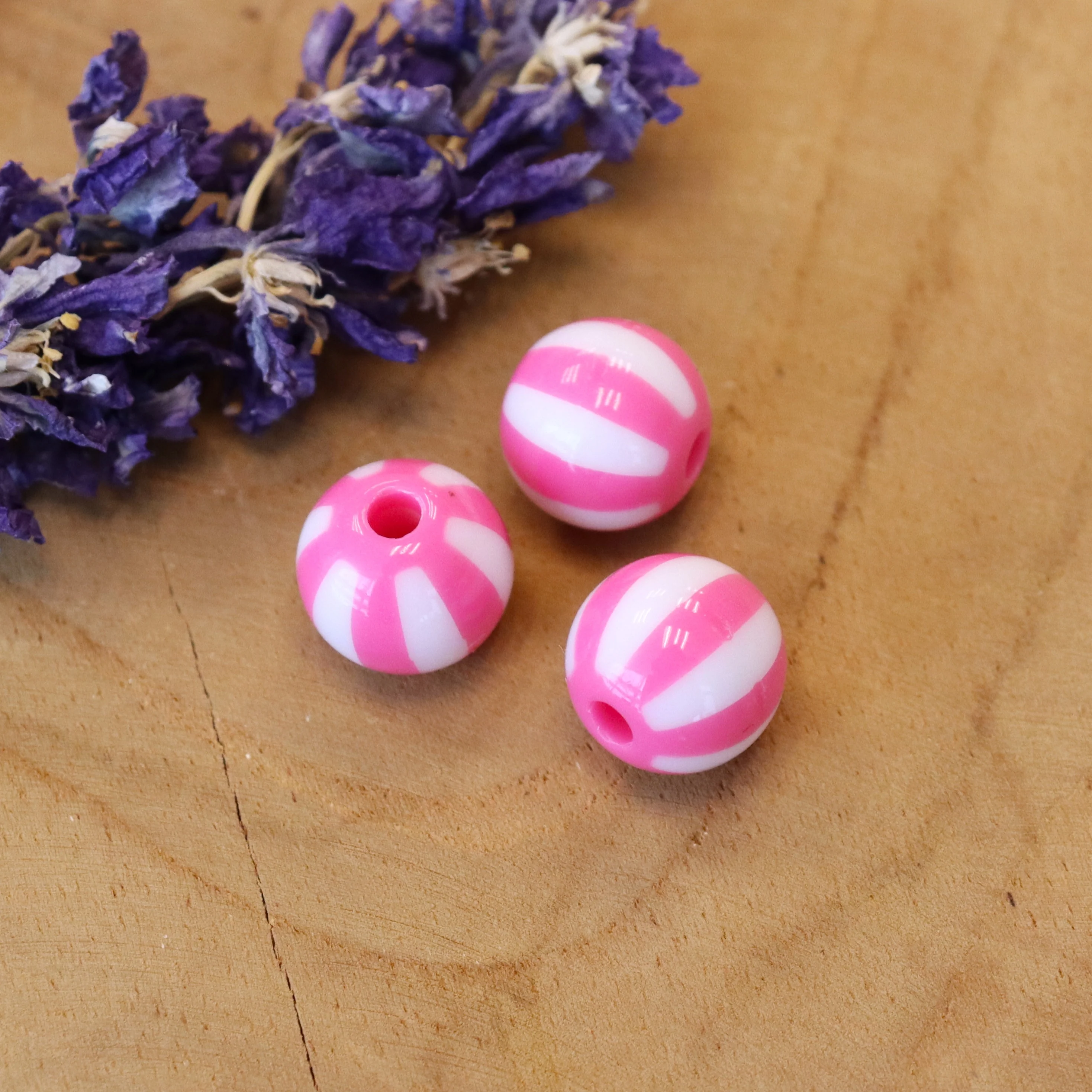Gestreepte acryl kraal - roze
