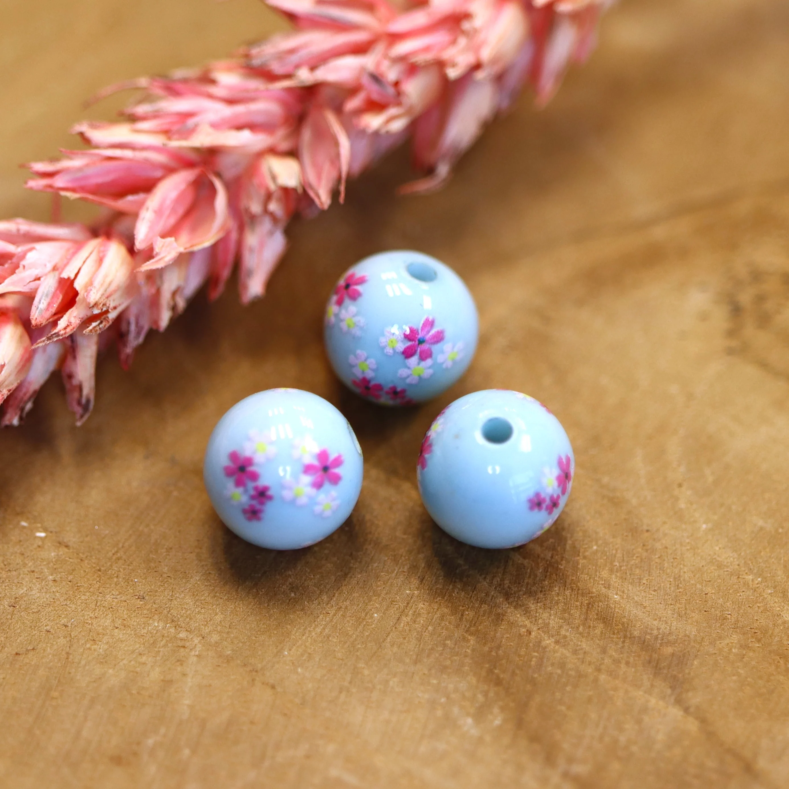 Kraal blauw - rond met bloemen