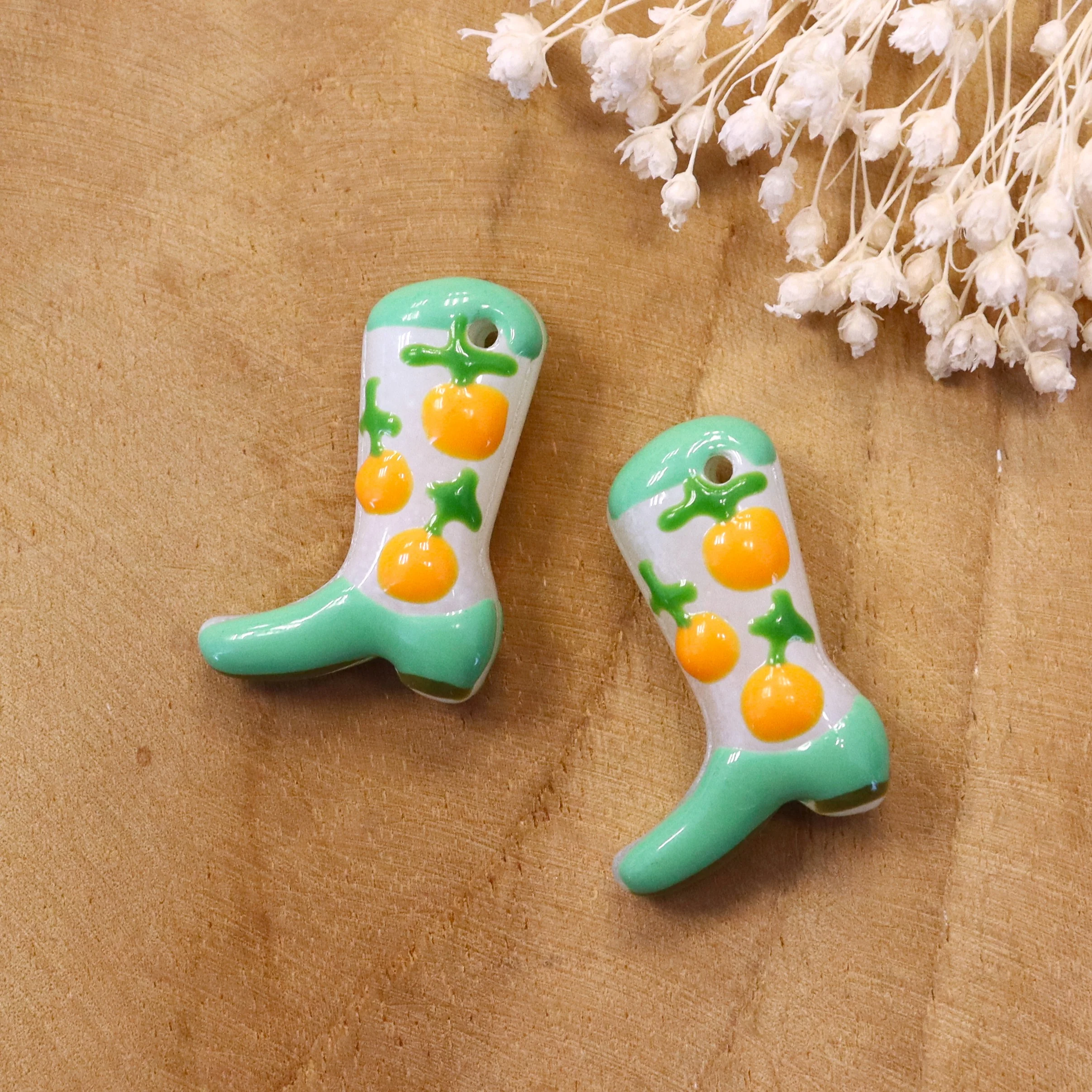 Lampwork cowboylaars - groen met sinasappels
