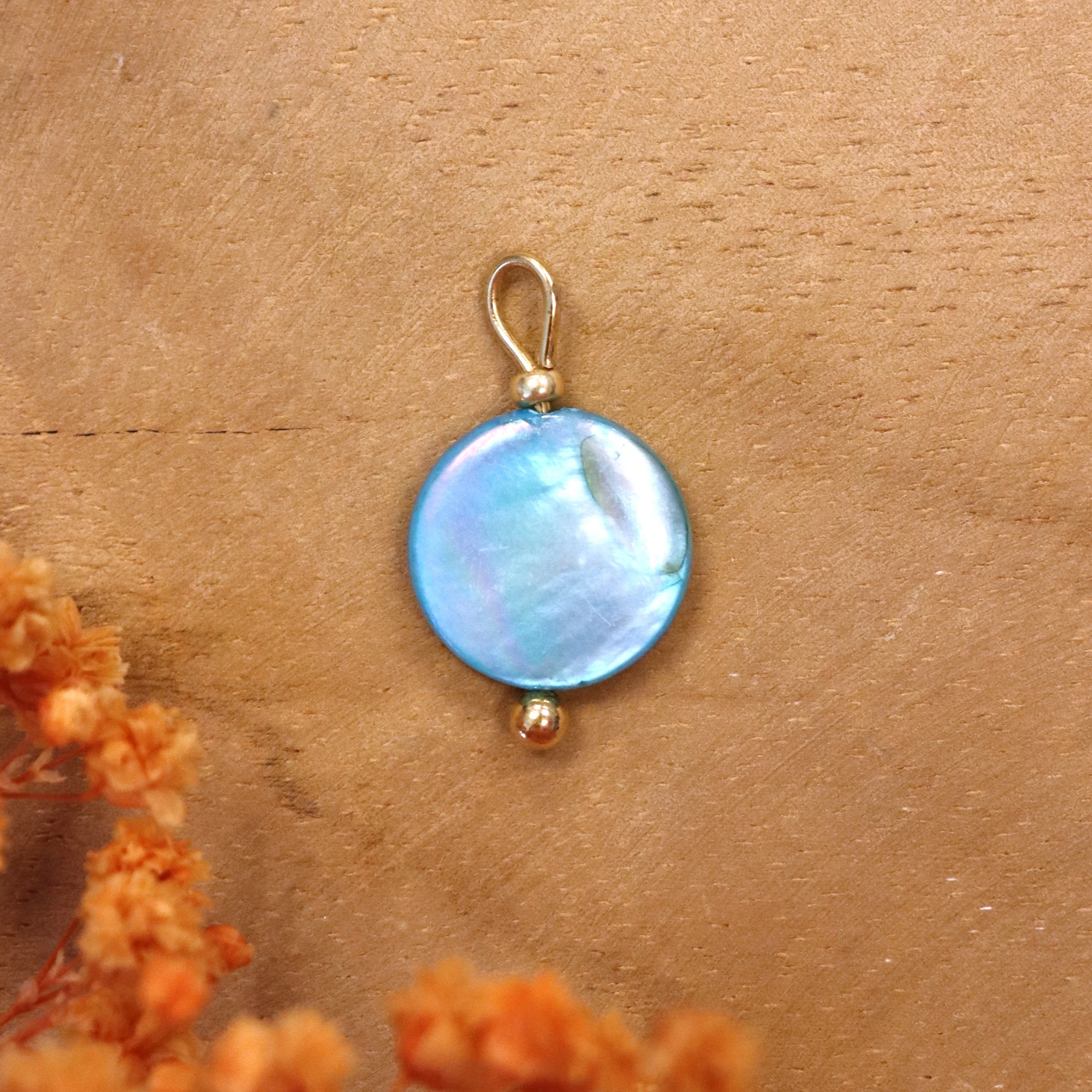 Oorringbedel blauwe schelp - goud