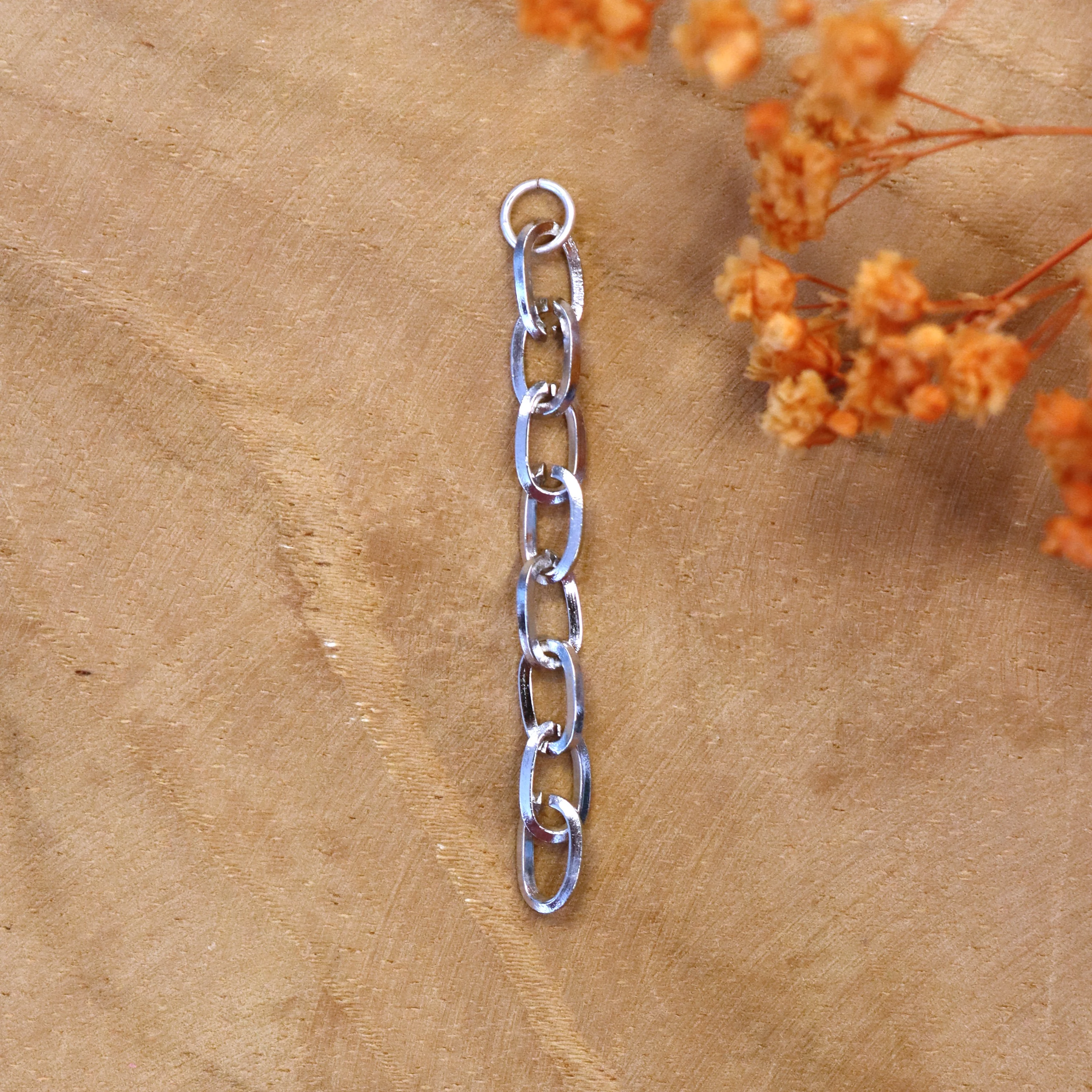 Oorringbedel schakelketting - zilver