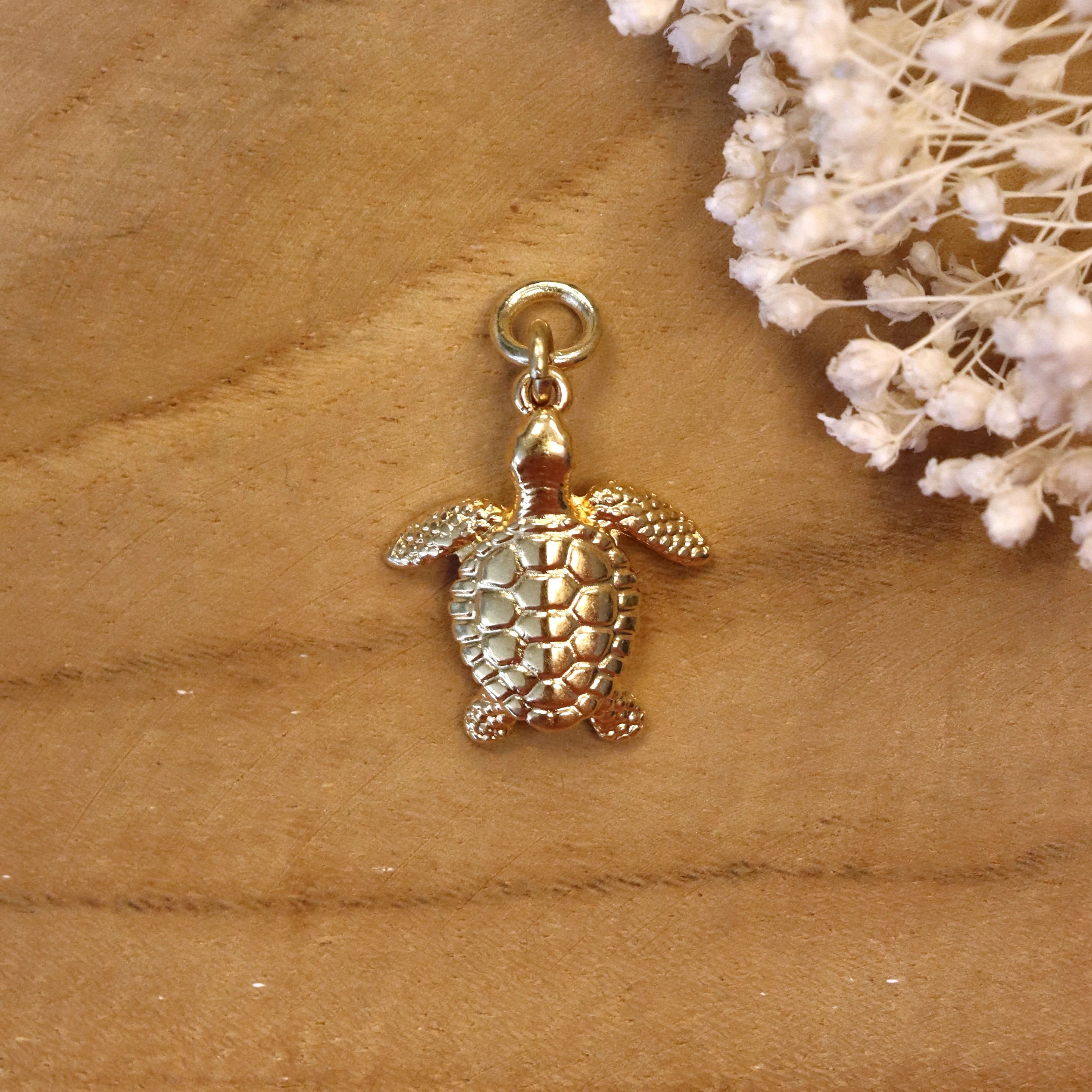 Oorringbedel schildpad - goud