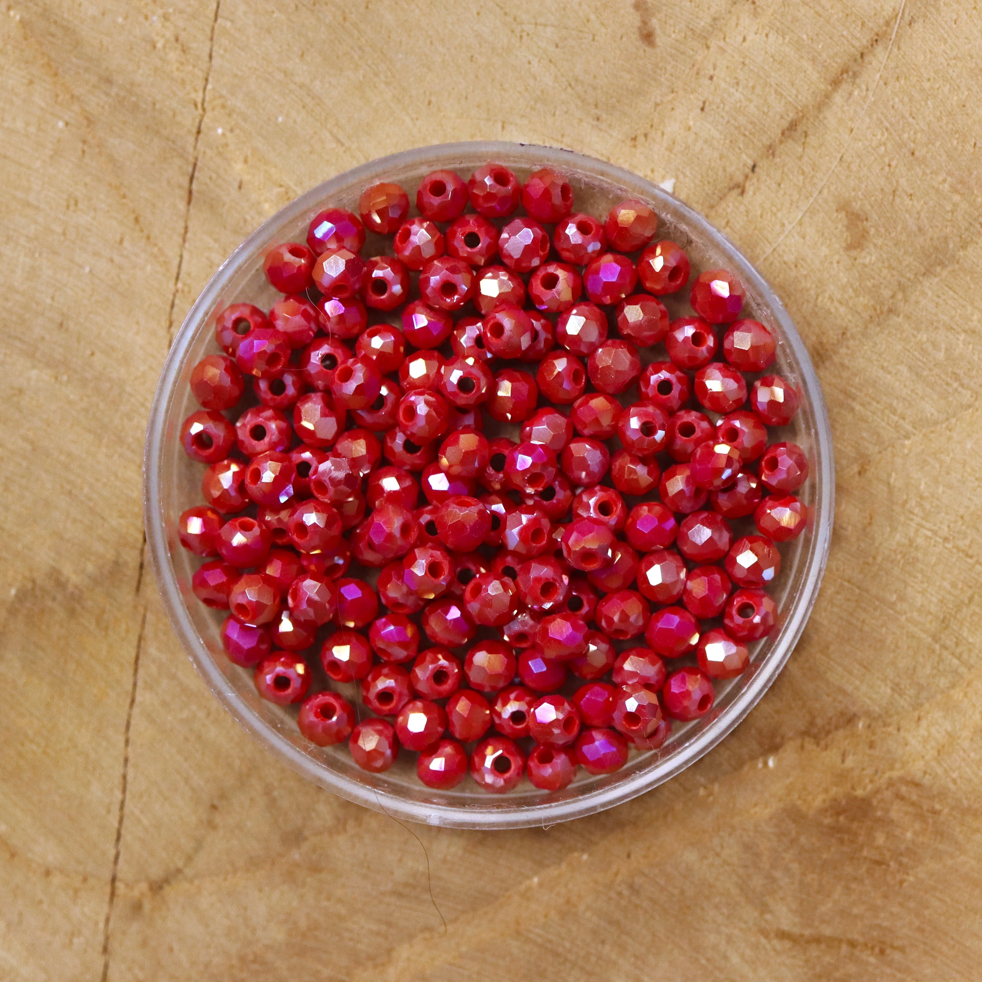 Rondel facetkralen 2x3 mm - AB dyed red